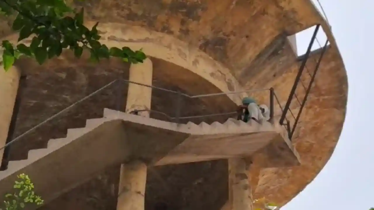 Farmer leader climbs on water tank, warns administration to jump if demands are not accepted